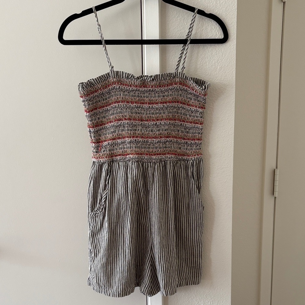 American Eagle Outfitters Striped Smocked Romper in Charcoal and White.